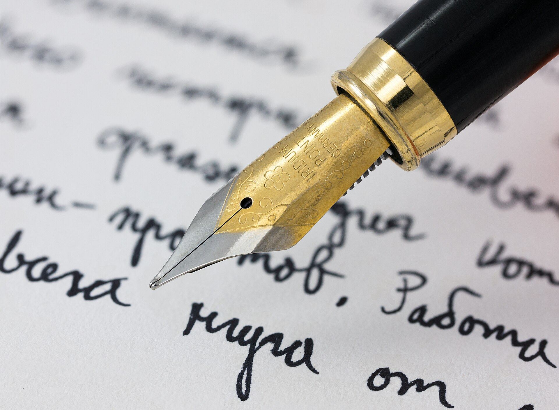 A fountain pen writing on paper